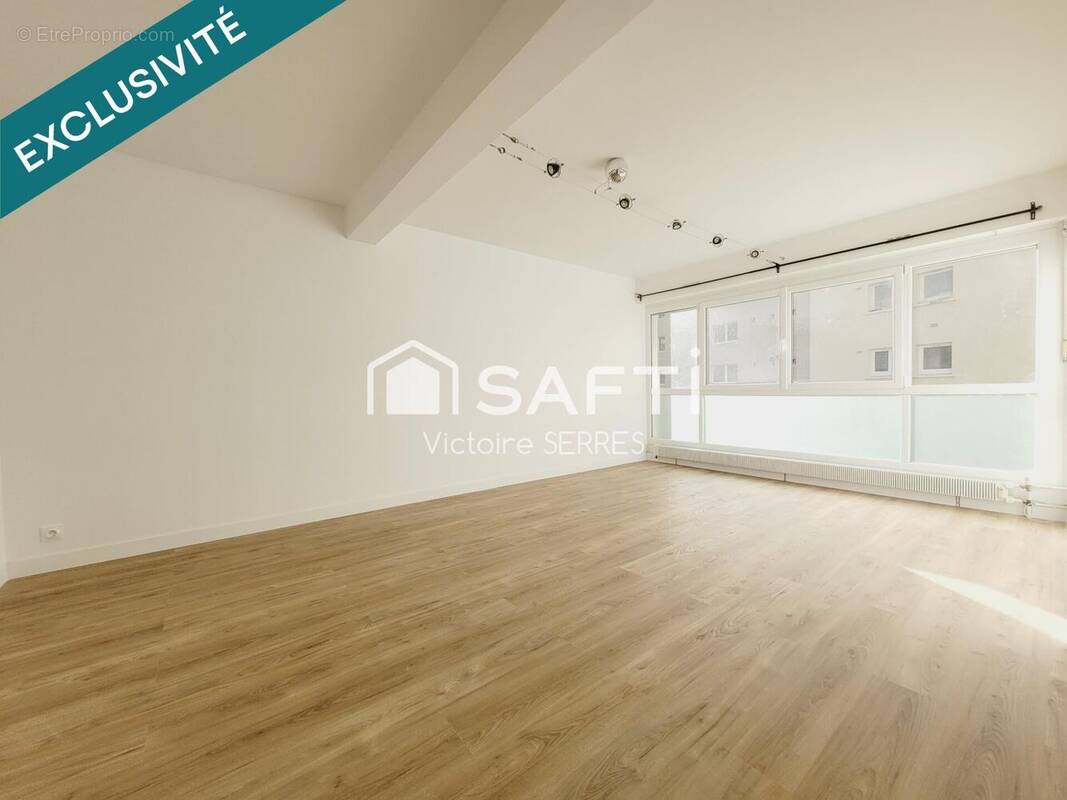 Photo 1 - Appartement à HEROUVILLE-SAINT-CLAIR