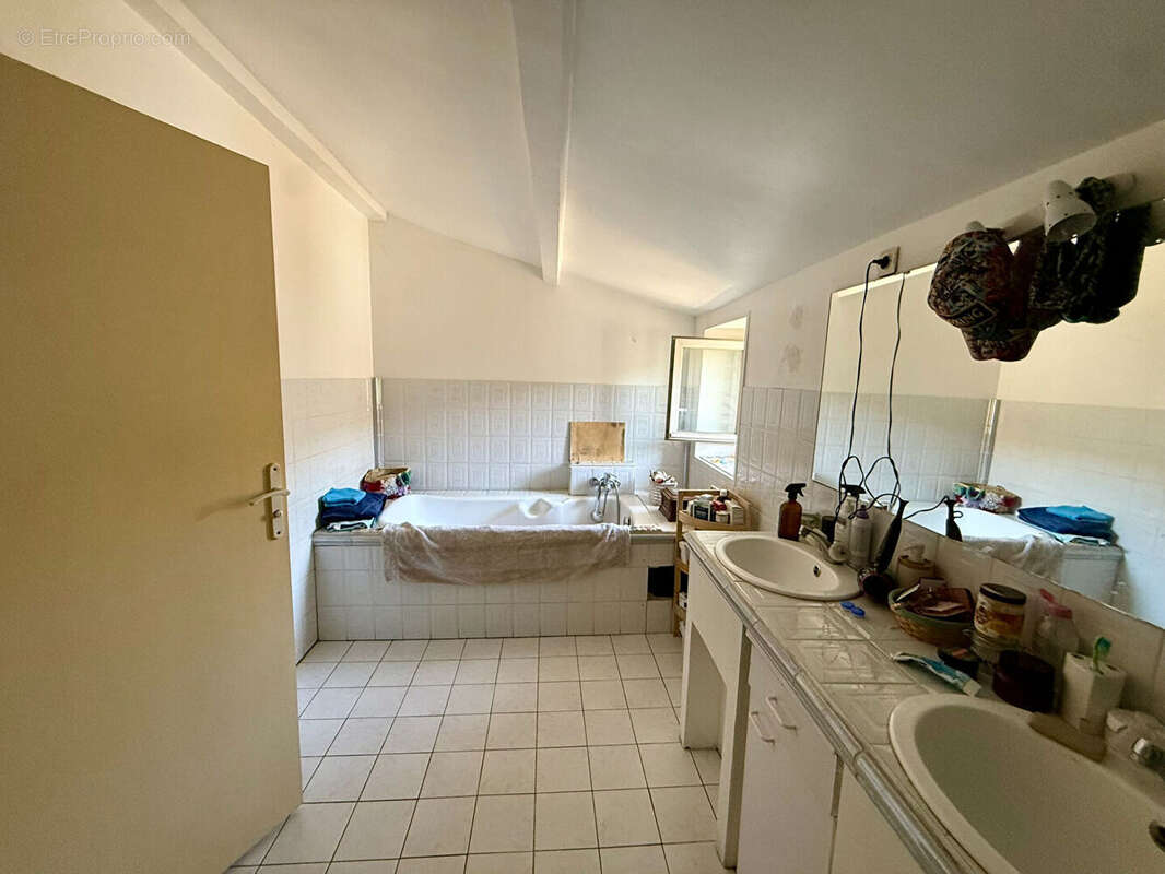 Maison de 198 m² avec deux logements distincts, terrasse, jardin et fort potentiel d'acquisition familiale ou patrimoniale - photo 16