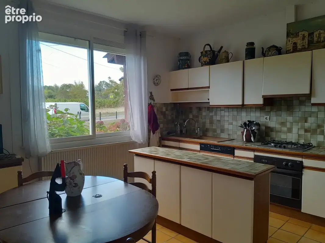 Maison des annee 60 avec grand sejour  veranda chauffee 3 chambres garage jardin 3097 m2 - photo 5
