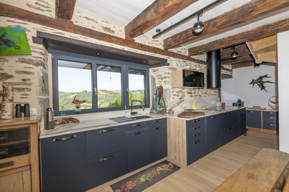 Maison 113 m² à Cassaniouze  - photo 4