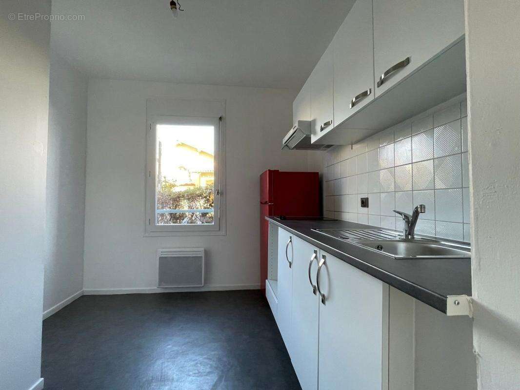 Quartier saouzelong- 2 pieces 49m²-parking - photo 2
