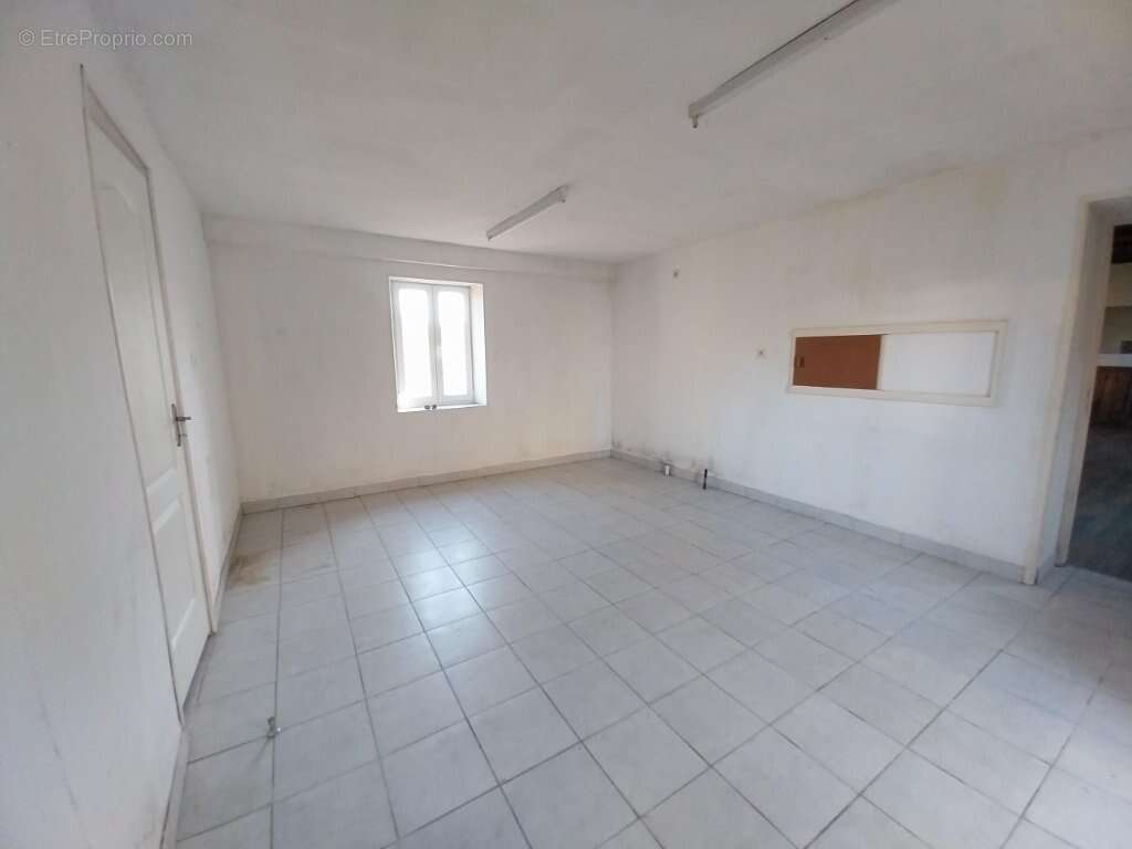 Appartement à SAINT-SYMPHORIEN-DE-MARMAGNE