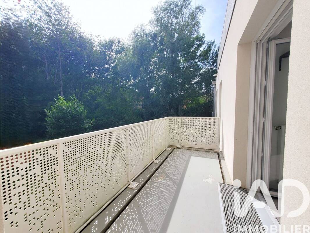 Photo 1 - Appartement à VOISINS-LE-BRETONNEUX