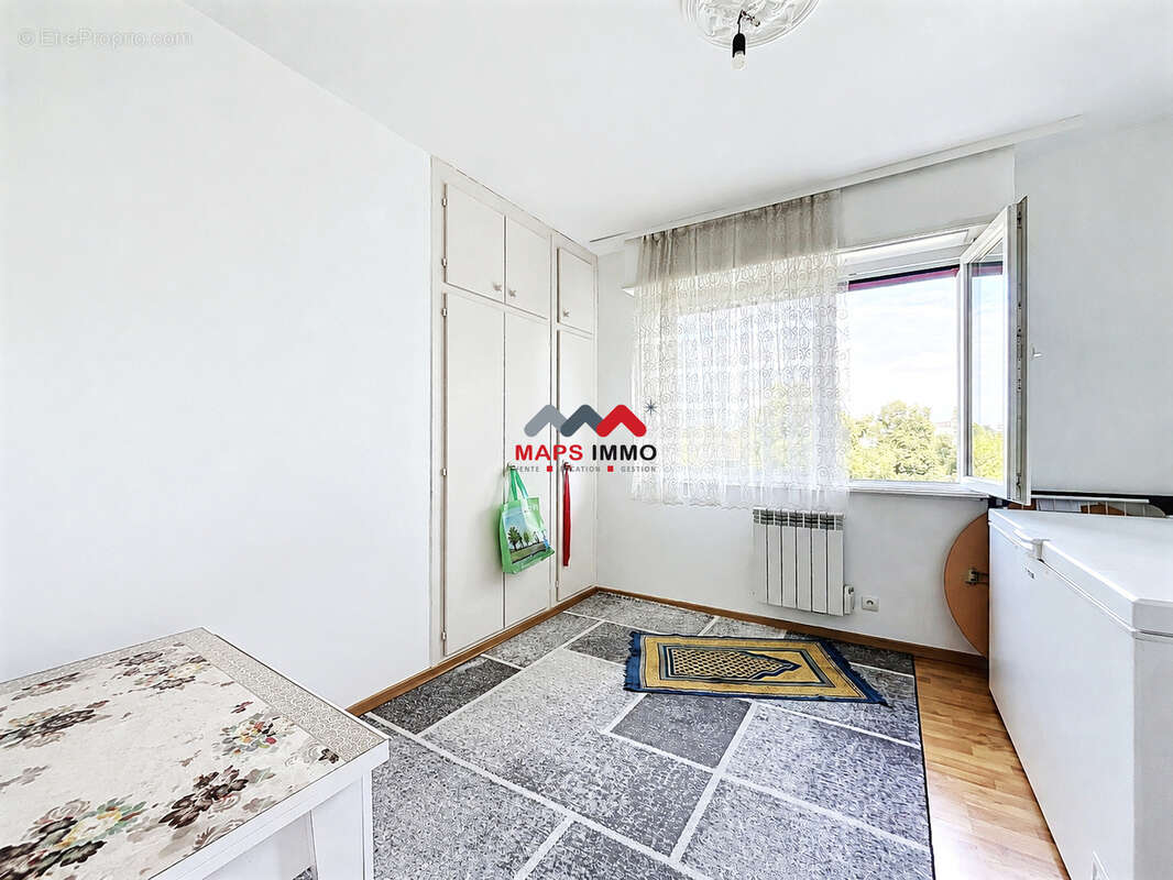 Appartement 4 pièces de 67m2, proche tram. - photo 8