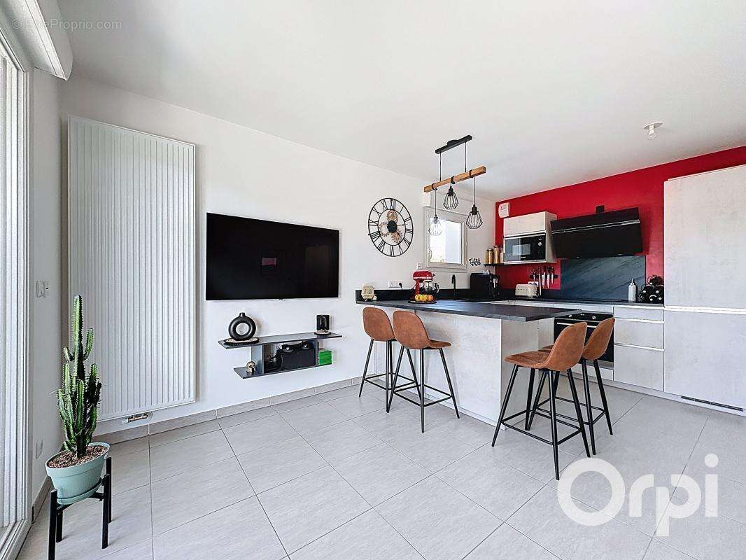 NANGY - Appartement rez-de-jardin - photo 2