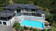 Magnifique_maison_architeque_individuelle_vetraz_monthoux_calme_frontiere_suisse_geneve_proche_ecole_bus_ceva_salon_sejour_cuisine_terrain_terrasse_jardin_piscine - Maison à VETRAZ-MONTHOUX