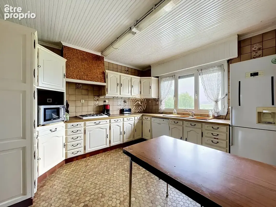 Maison 6 pièces 157 m² à vendre à Raimbeaucourt (59283) - photo 6