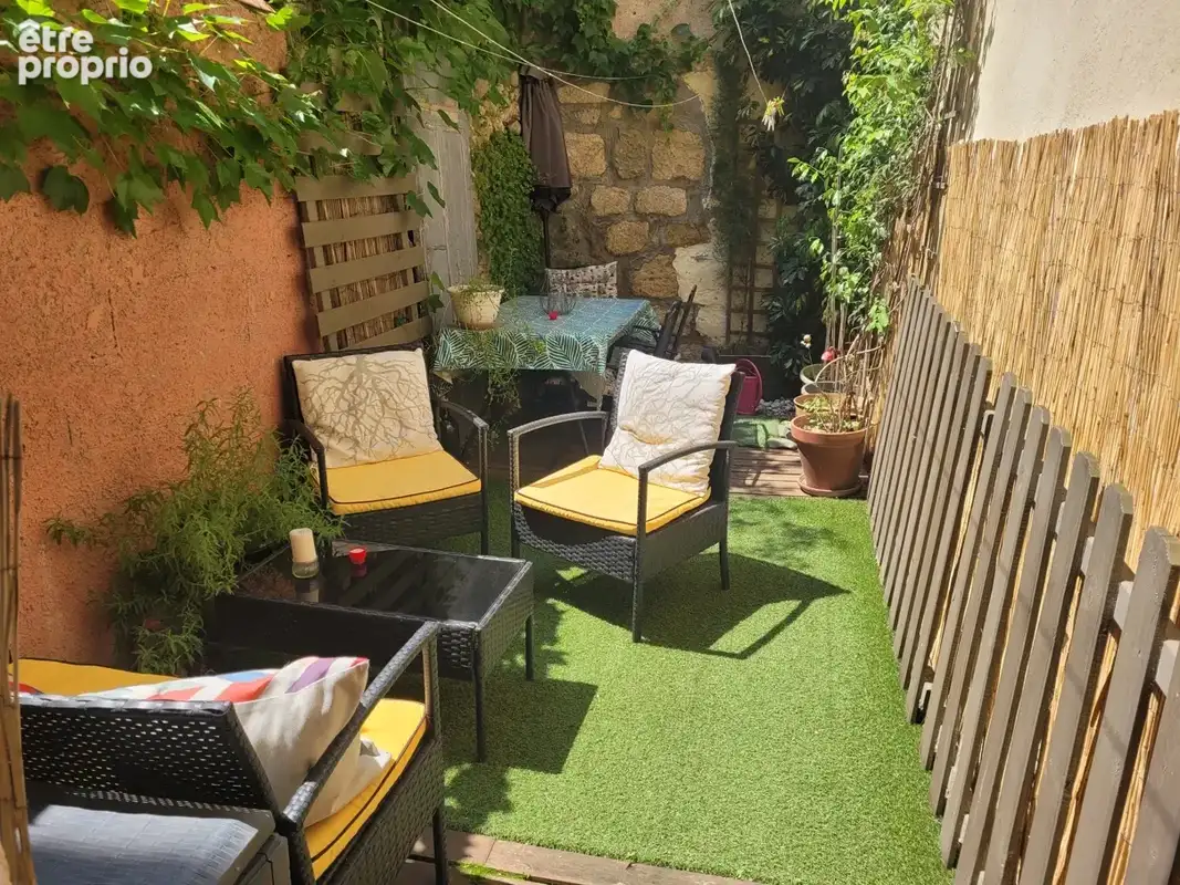Charmant appartement de caractère avec cour et sa cuisine d'été. - photo 3