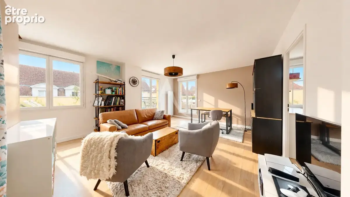 Appartement Vaureal  F5 en DUPLEX  au COEUR DE VILLE  de 75 m2 avec 43 m2 de terrasse et 2 places de parking en sous sol. - photo 2