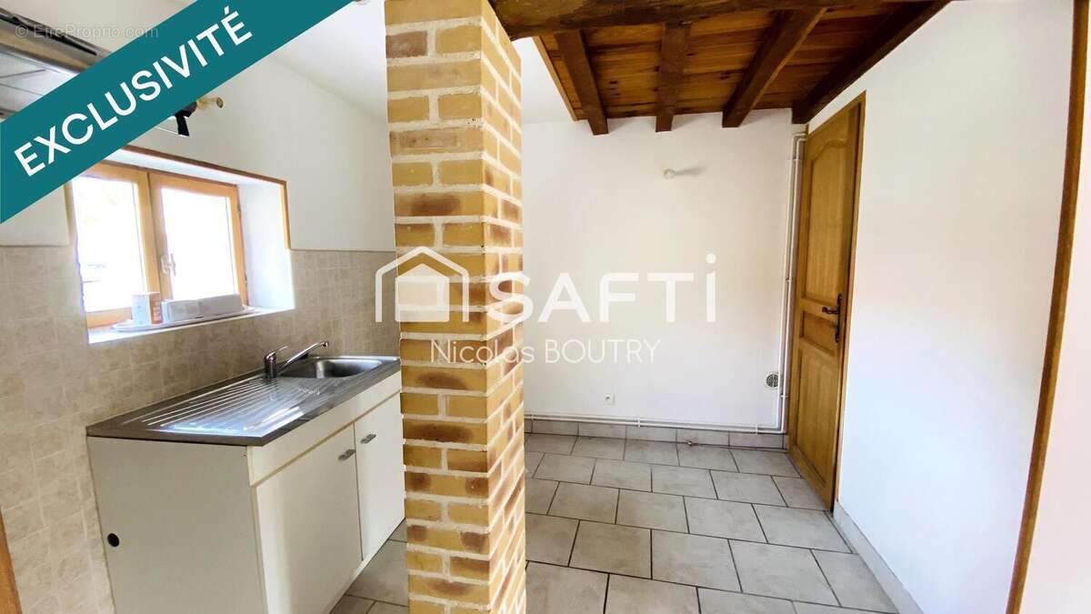 Photo 3 - Maison à LESQUIELLES-SAINT-GERMAIN