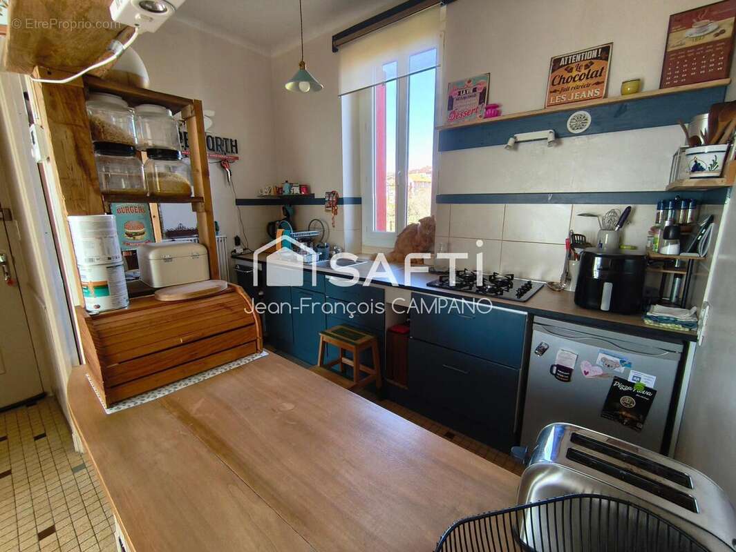 Photo 2 - Appartement à LIVINHAC-LE-HAUT