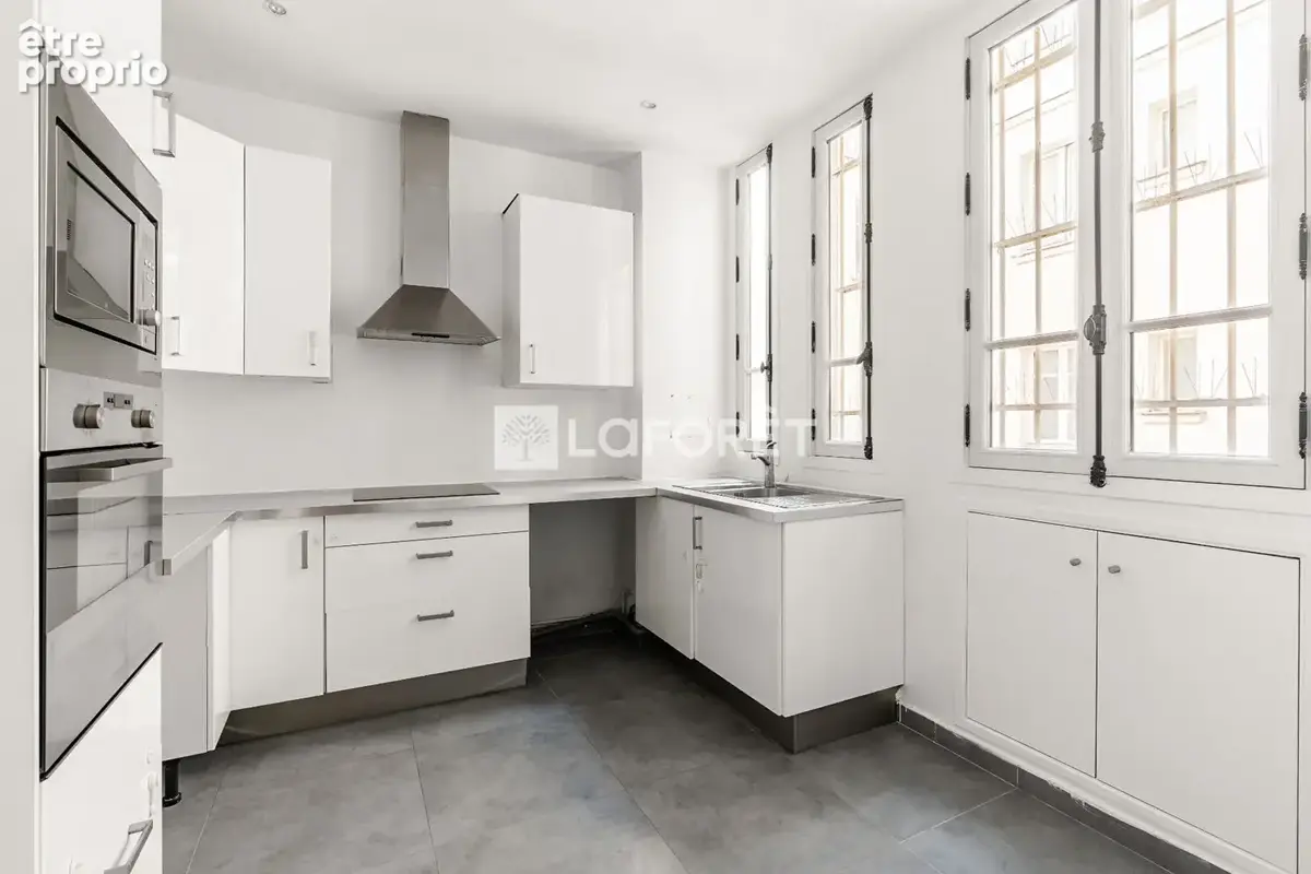 Paris 17 - etage eleve - ascenseur - sud ouest - dpe d - photo 6