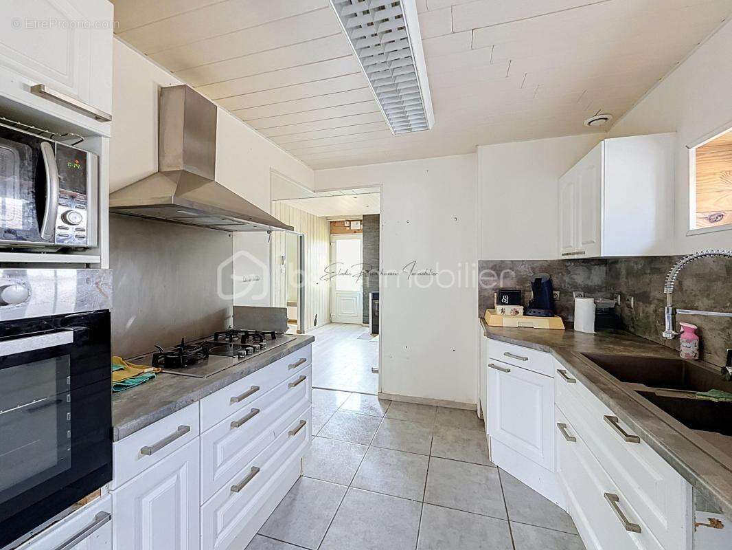 Maison familiale de 103 m² avec 4 chambres, jardin clos et sous-sol complet - photo 12