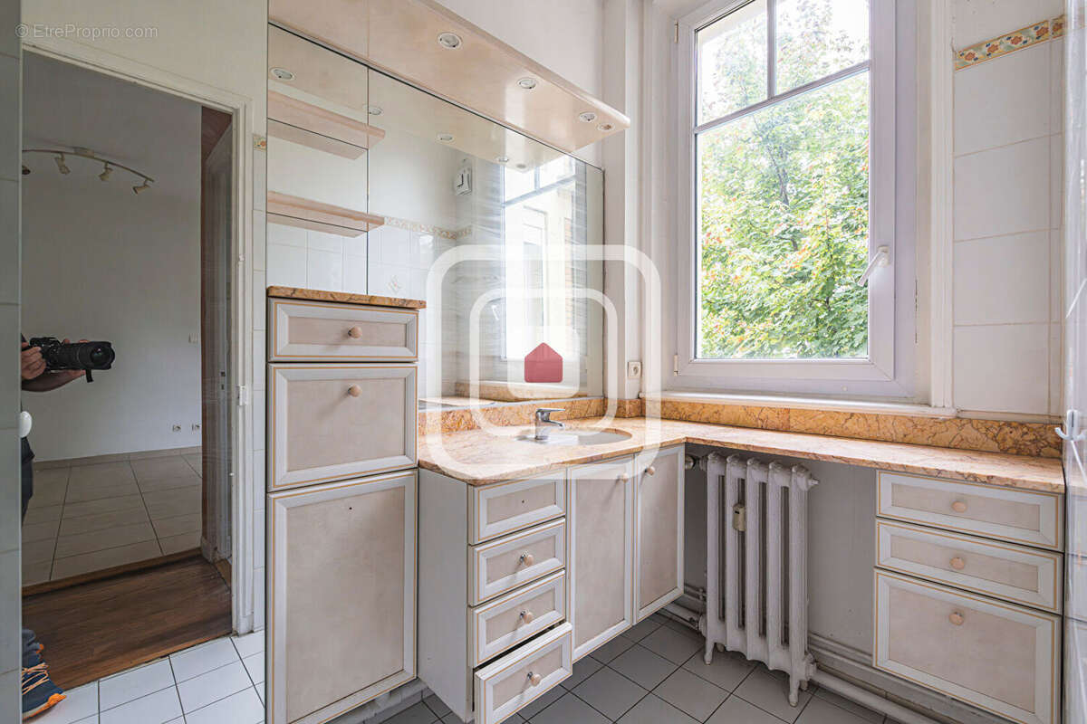 Appartement en duplex de 120m² avec 3 chambres et 2 salle de bain / douche - photo 7
