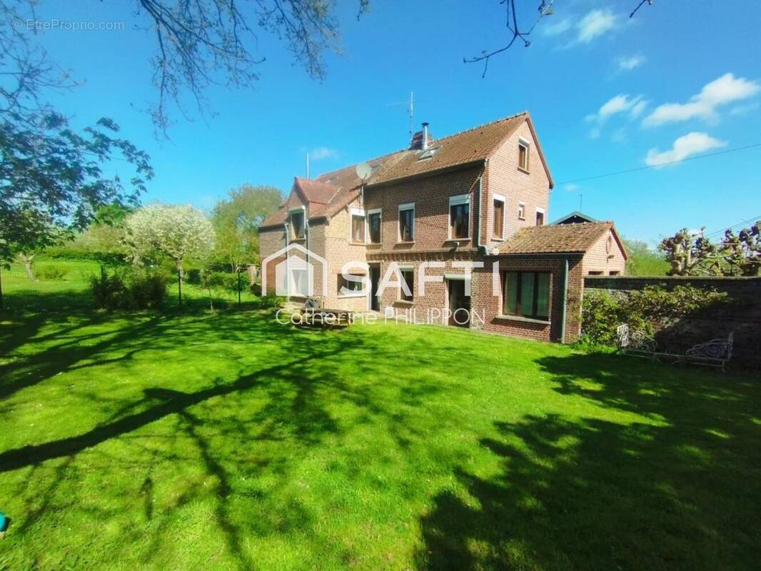 Photo 1 - Maison à NEUVILLE-EN-AVESNOIS
