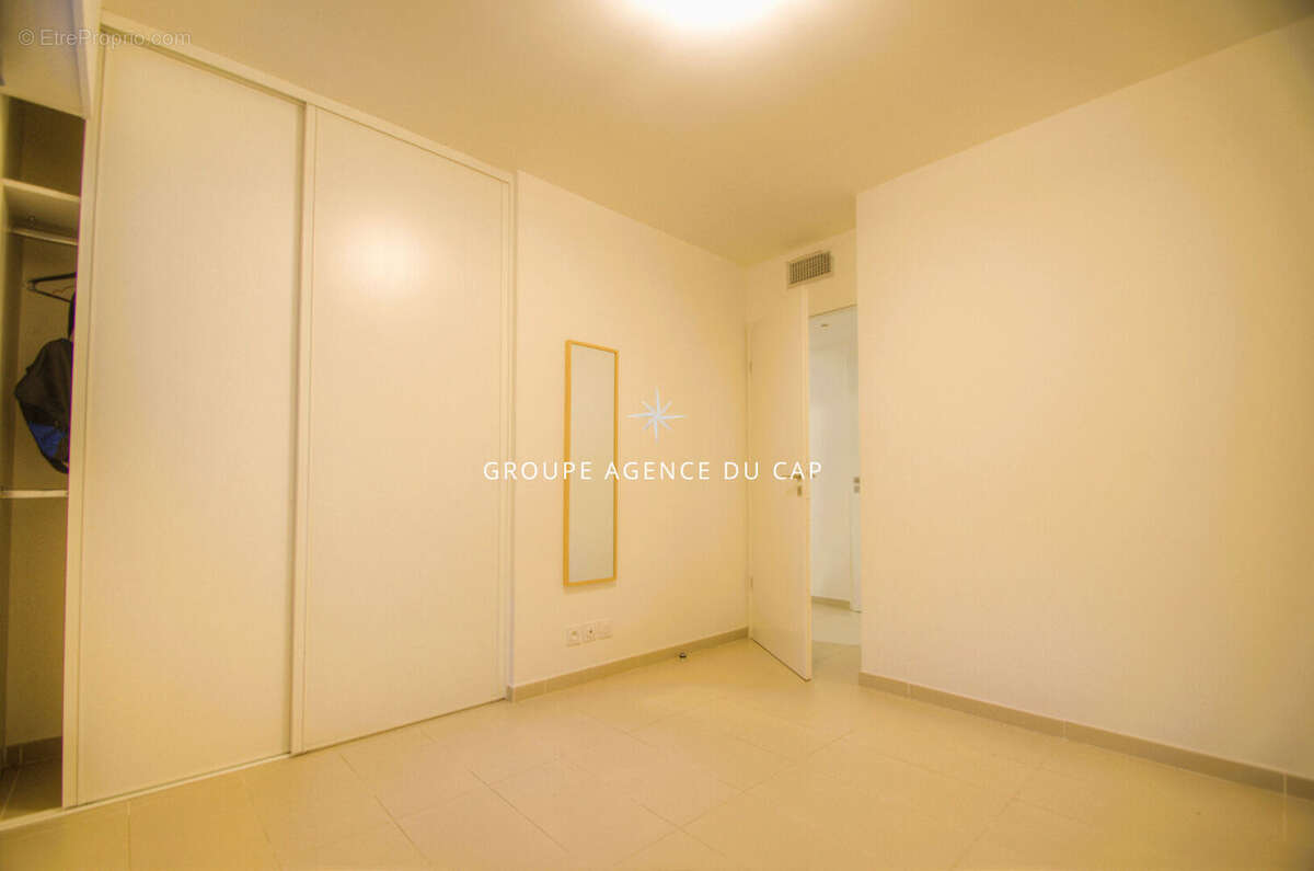 Appartement en rez de jardin dans residence - photo 7
