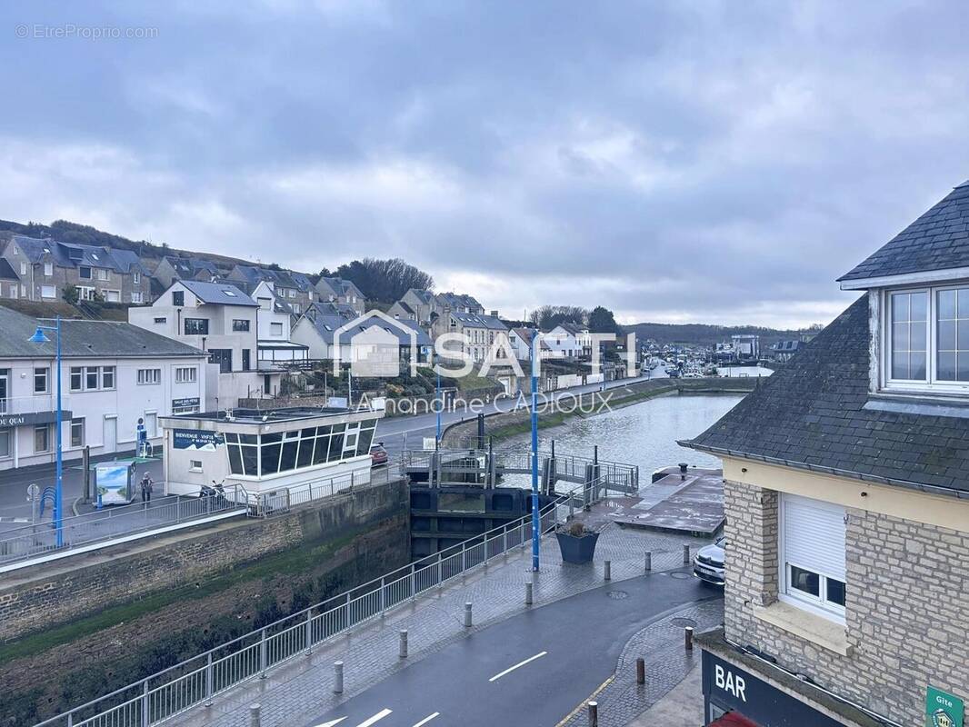 Photo 1 - Commerce à PORT-EN-BESSIN-HUPPAIN