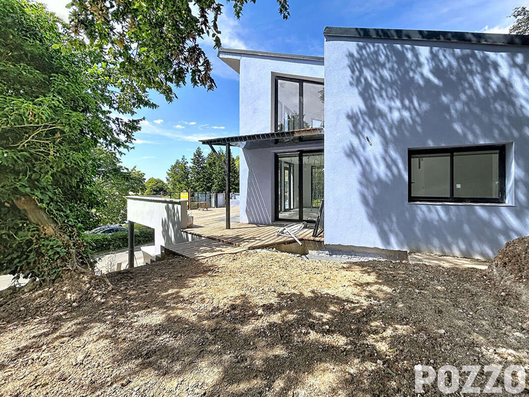 Maison contemporaine dans un écrin de verdure - photo 9