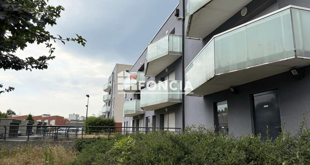 LOOS appartement type 2  avec un grand  balcon et un stationnement en résidence récente - photo 4