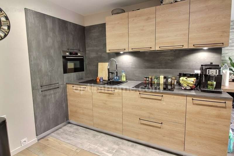 Appartement 3 pièces de 56 m2 avec cave et parking à vendre à POISSY (78) - photo 2