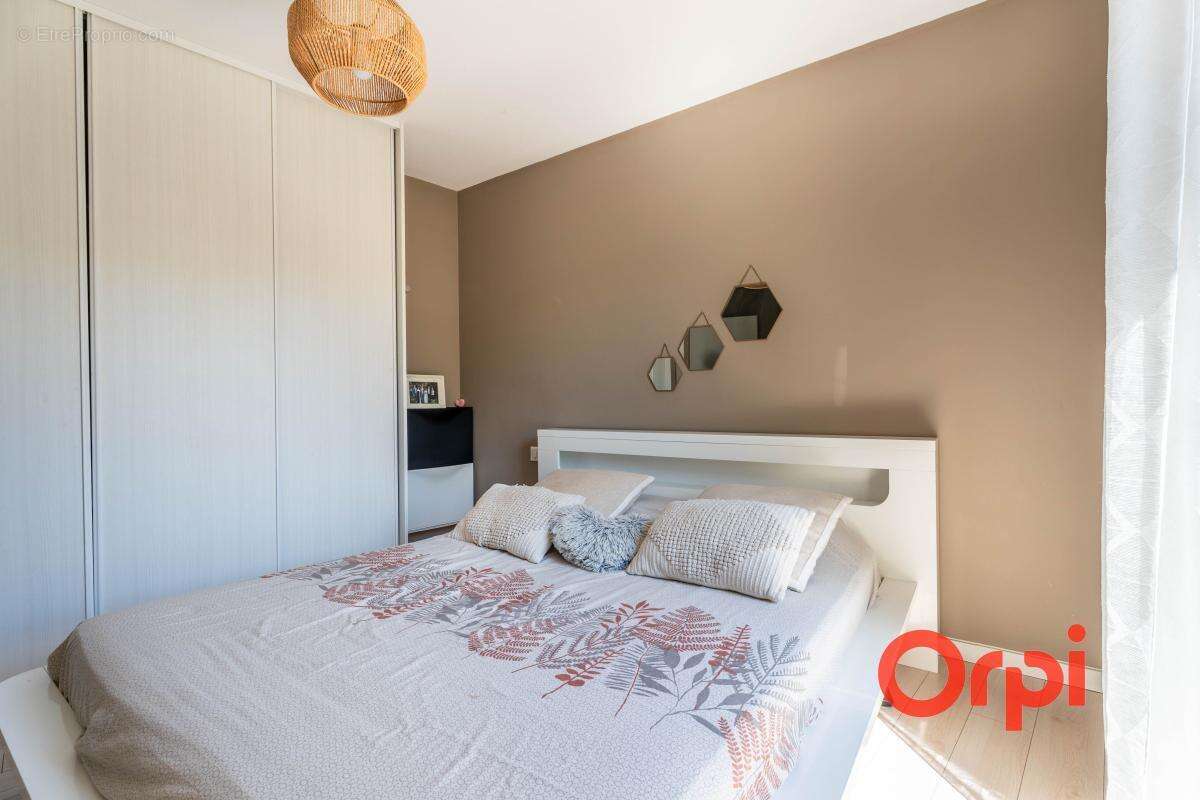 Appartement en rez-de-jardin avec un garage - photo 9