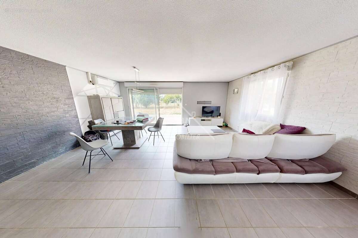 Maison de plain-pied 120 m² - photo 2