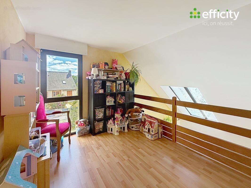 Maison 120 m² à Saint-Jacques-De-La-Lande  - photo 7