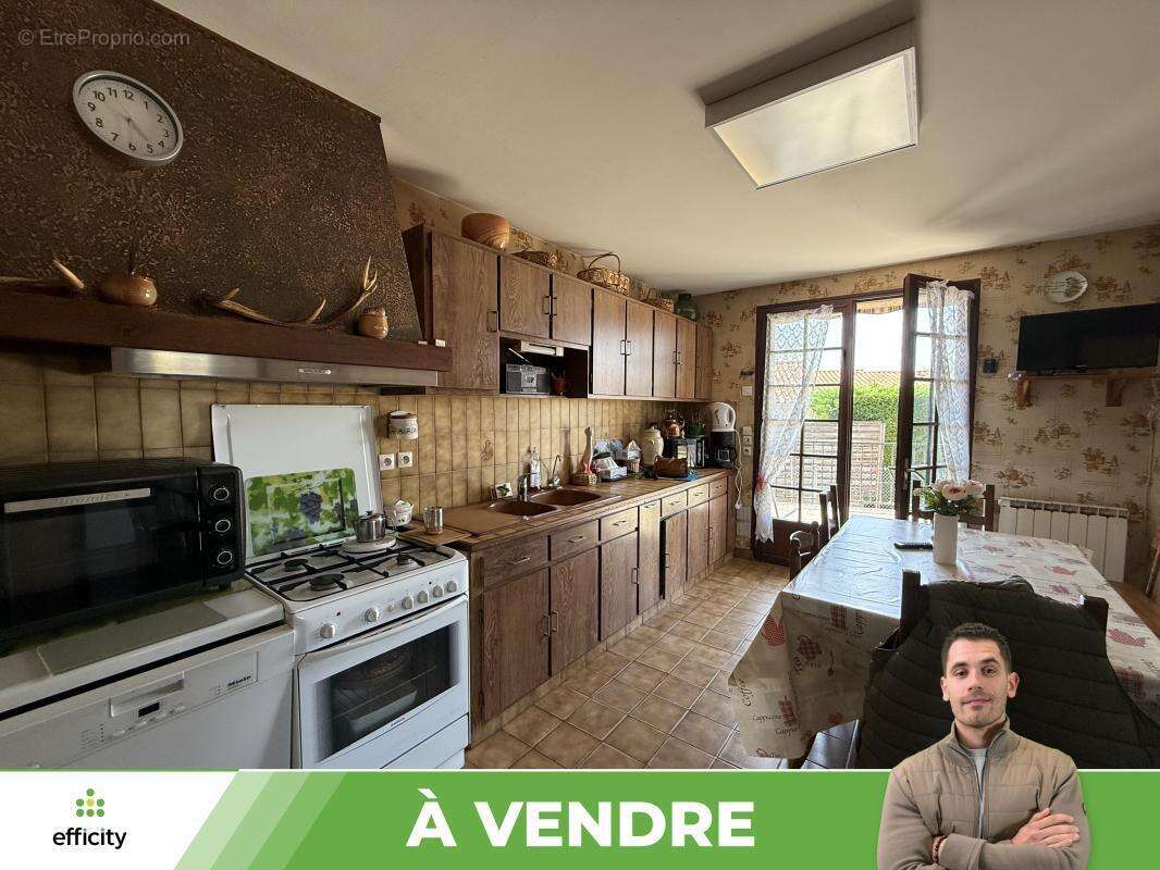 Maison 127 m² à Fontaine-Le-Comte  - photo 6