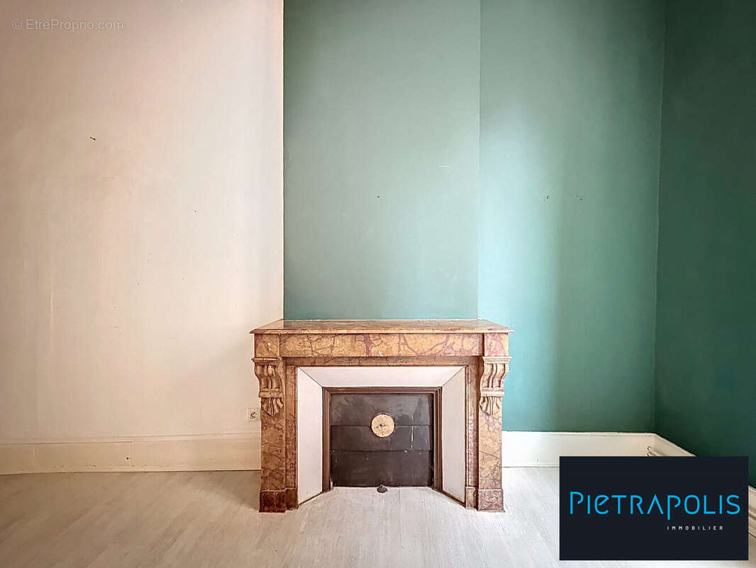 Cheminée - Appartement à DOLE