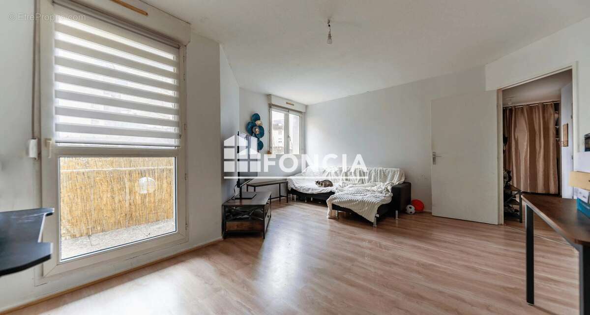 EXCLUSIVITE FONCIA -  Spacieux trois pièces avec balcon et parking intérieur - photo 3