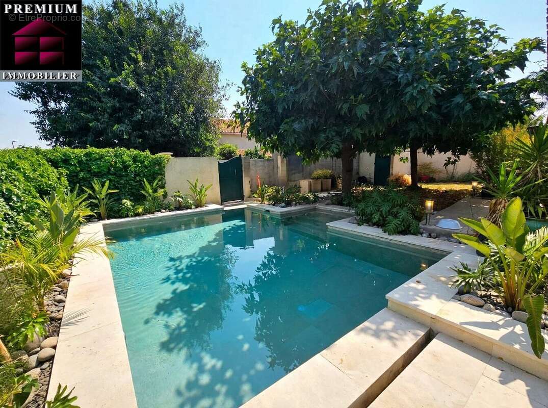Maison traditionnelle 3 faces  130 m² habitables  Quartier recherché de BAHO - photo 4