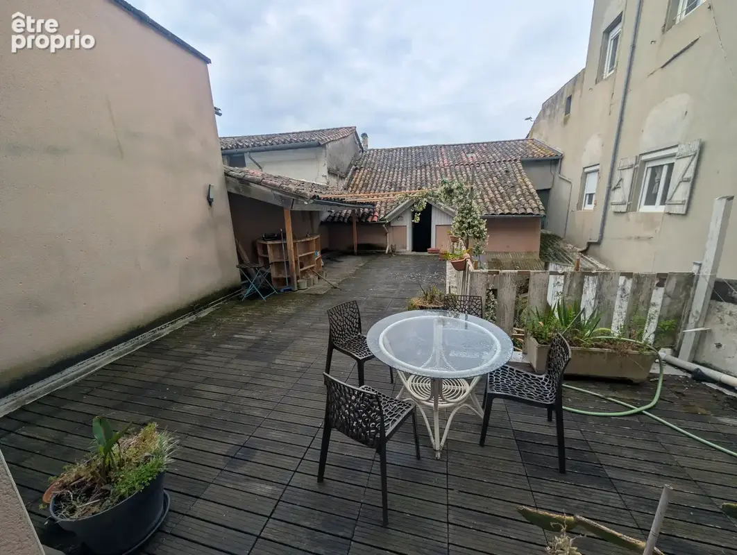 Immeuble pour habitation et commerce en centre ville - photo 11