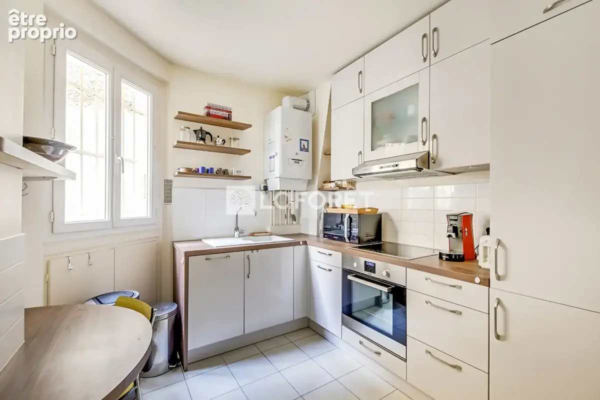 Paris 18e - rue désiré ruggieri - charmant 2 pièces de 40 m² - photo 11
