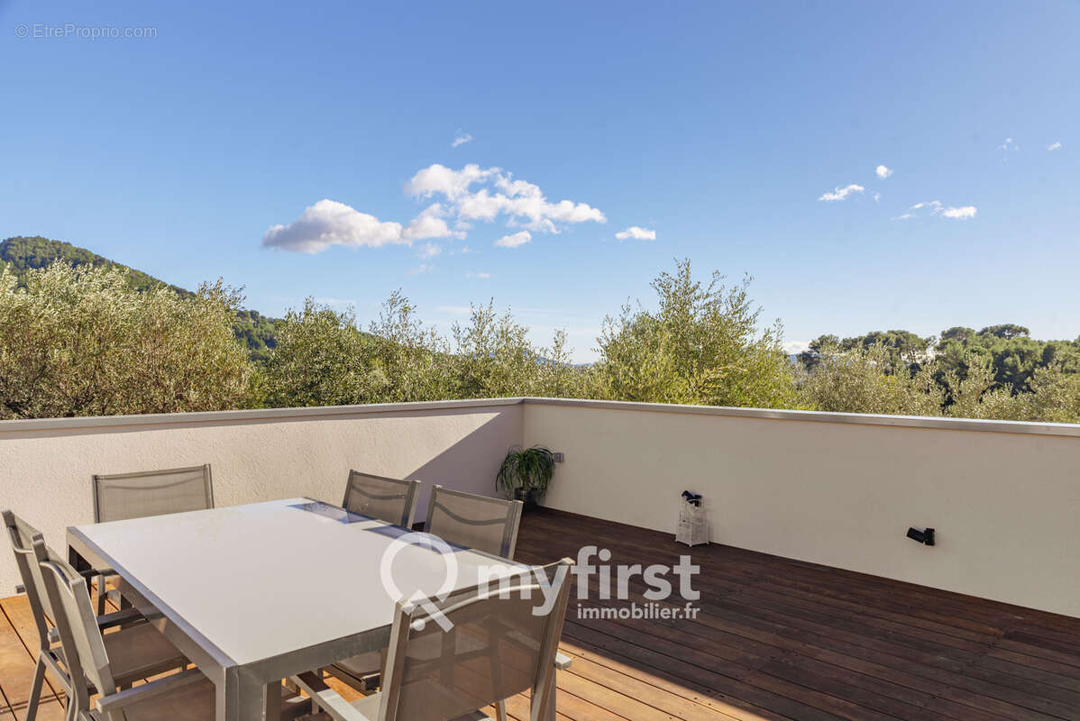 Un appartement entre jardin secret et rooftop suspendu - photo 5