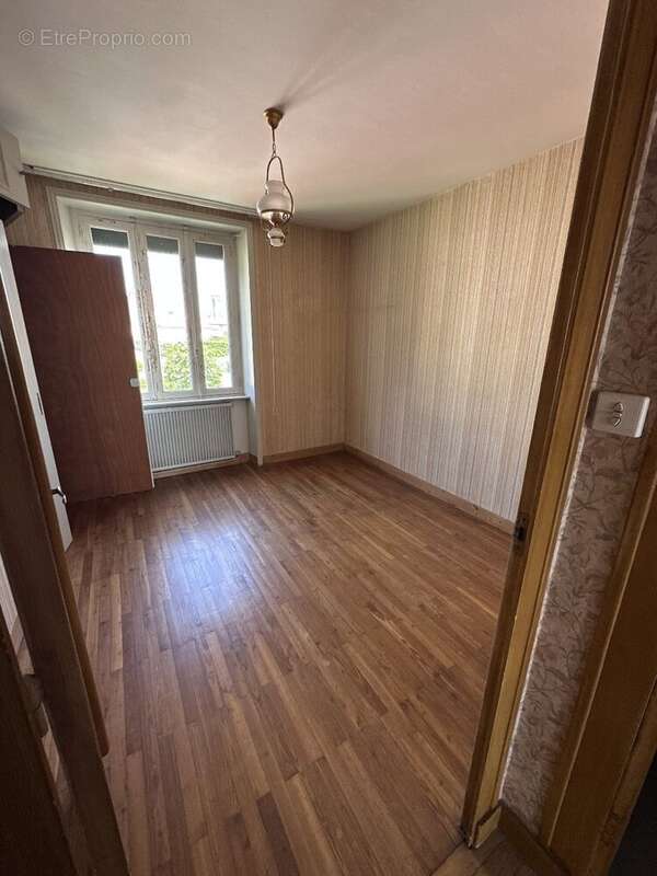 Maison avec jardin et possibilité d'acquisition d'un terrain constructible supplémentaire - photo 8
