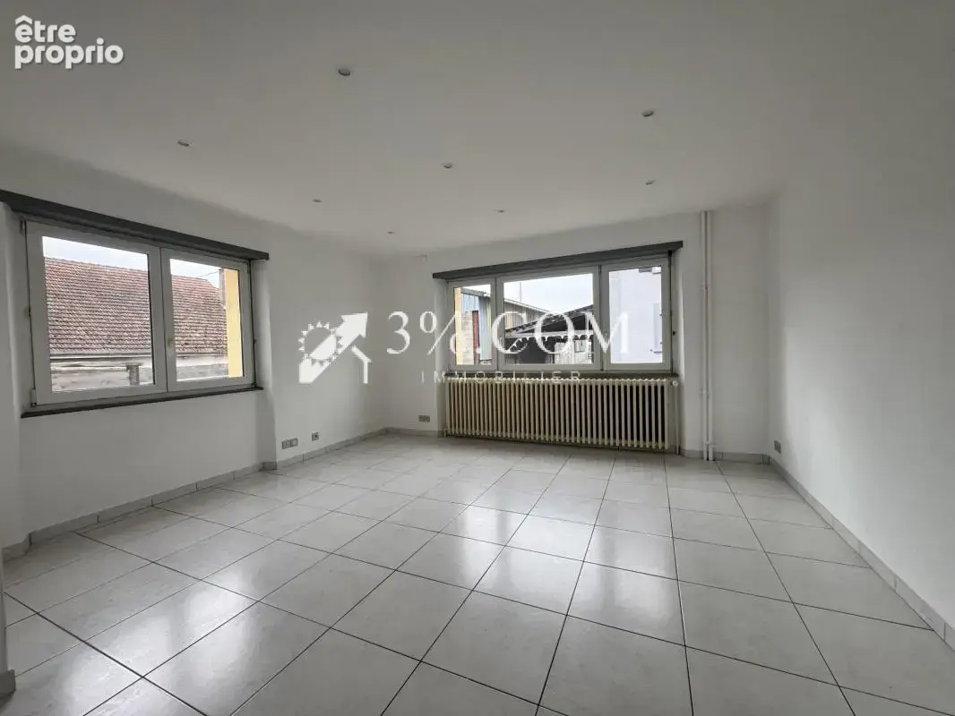 3%COM Grand F4 avec balcon - cour et caves - photo 8
