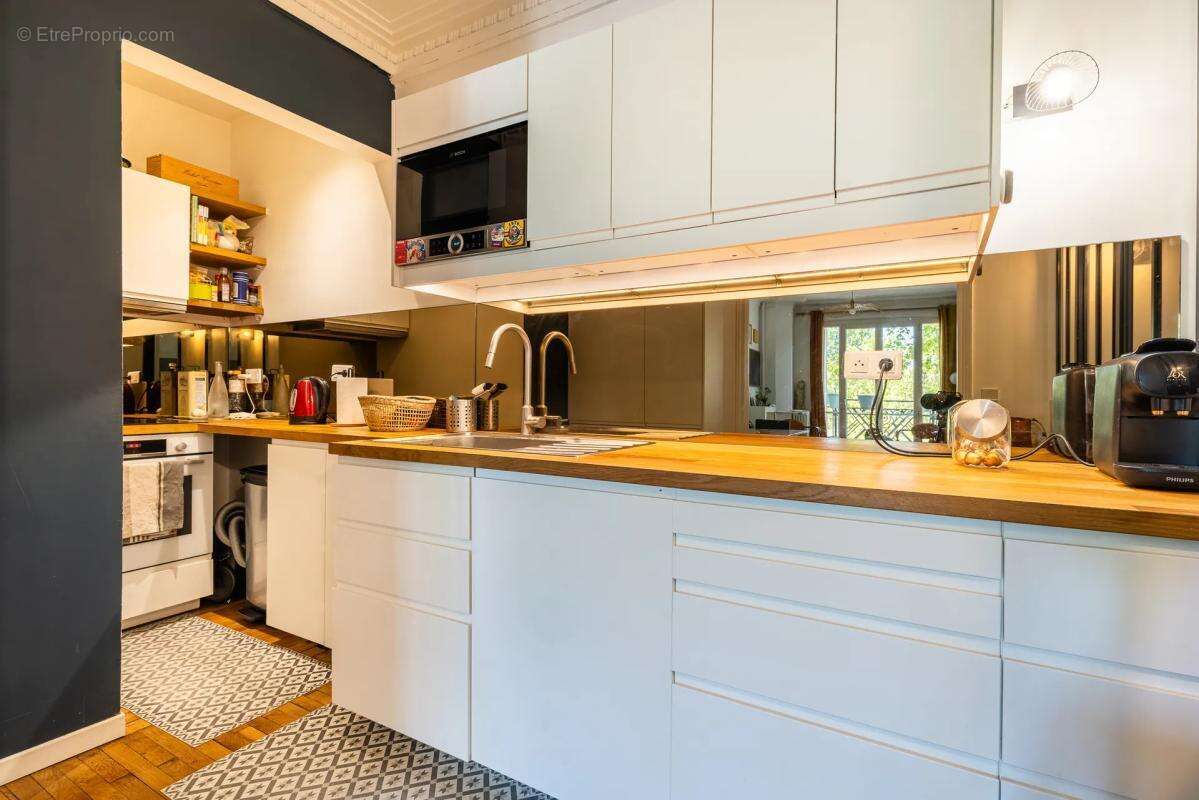 Appartement de 4 pièces d'environ 75m² à Paris XVII - photo 4