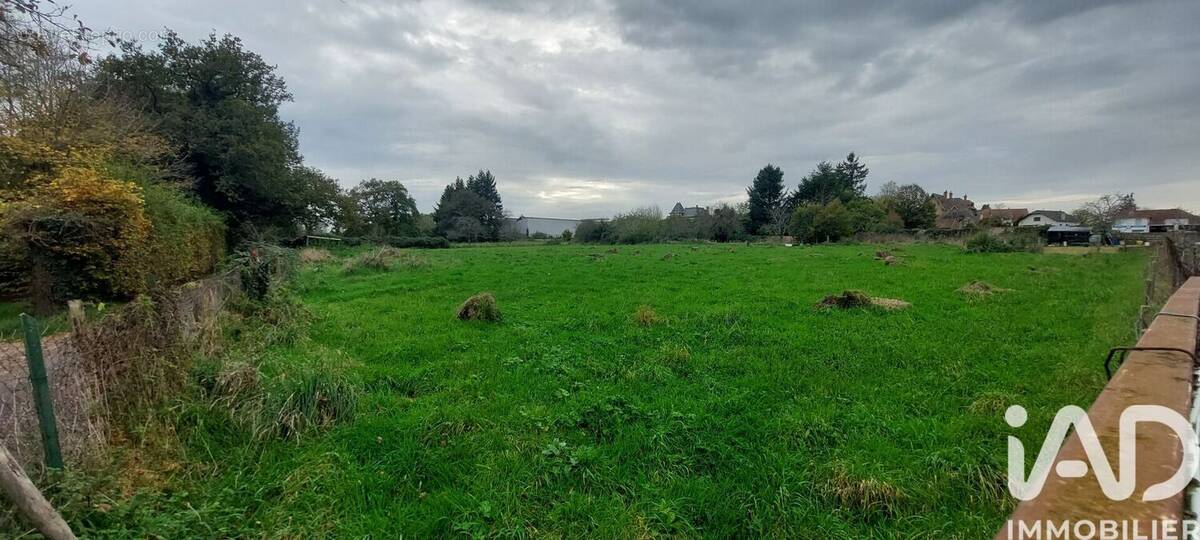 Photo 1 - Terrain à EVAUX-LES-BAINS