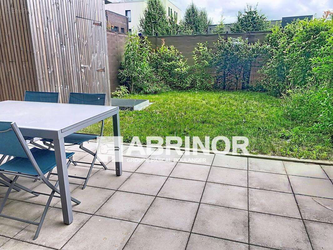 Lille - Appartement de Type 4 - Duplex - 3 chambres - Jardin - 1 place de parking - photo 4