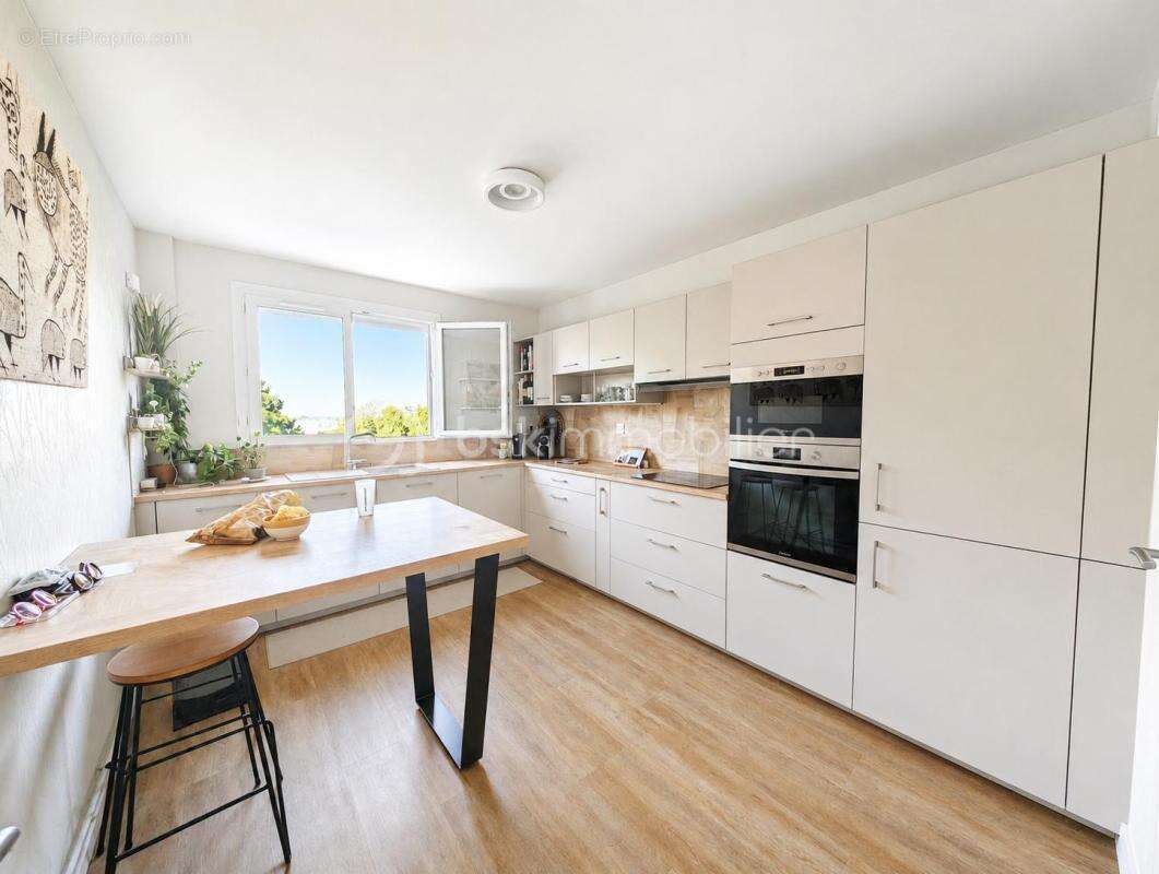 Appartement traversant de 120m2 - photo 3
