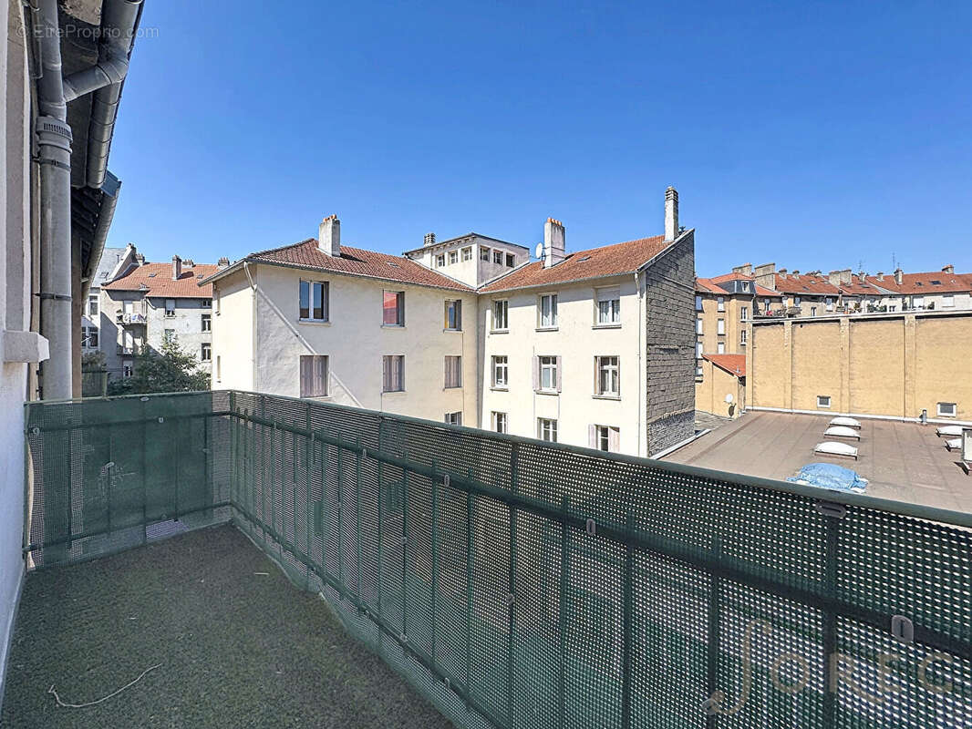 Appartement F4 de caractère avec balcon à proximité immédiate de la Gare - photo 5
