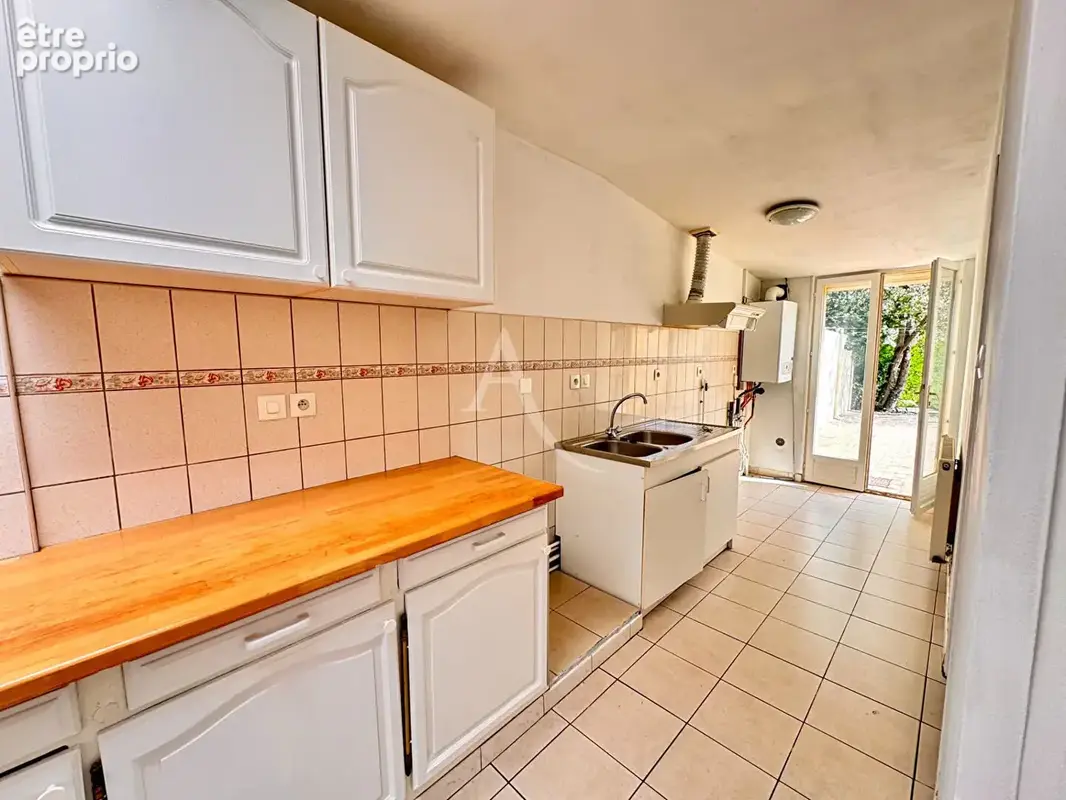 Maison 4 chambres à Lens - photo 2