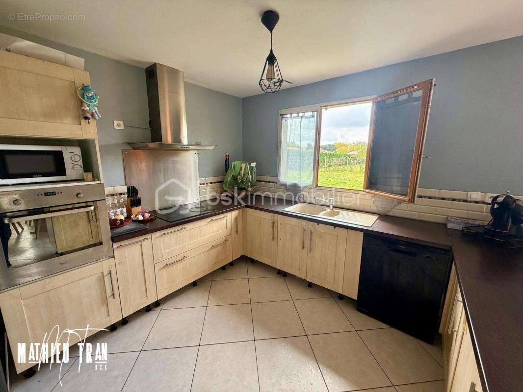Chaleureuse maison à vendre dans un cadre enchanteur - photo 4