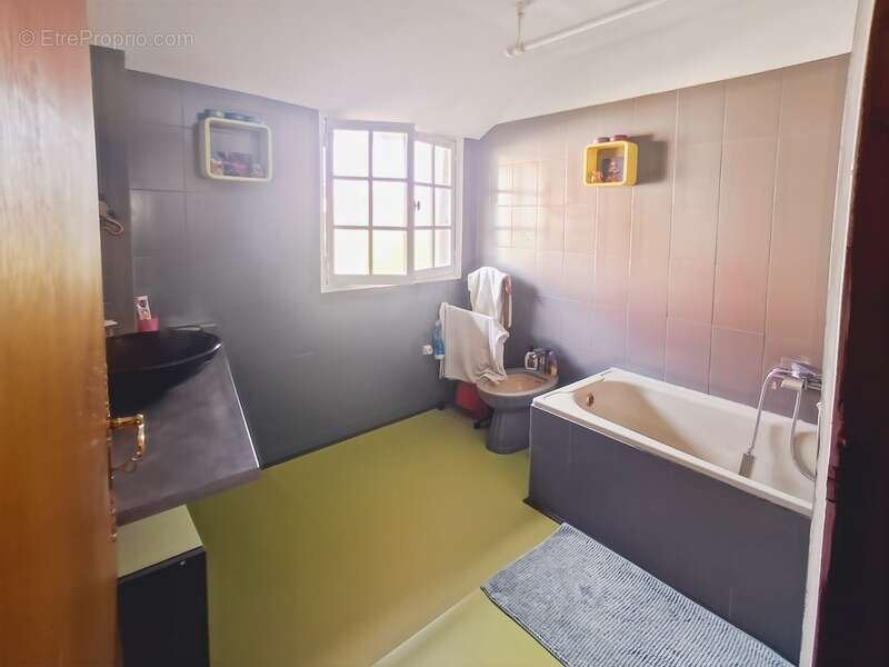 Charmante maison de trois chambres - photo 11