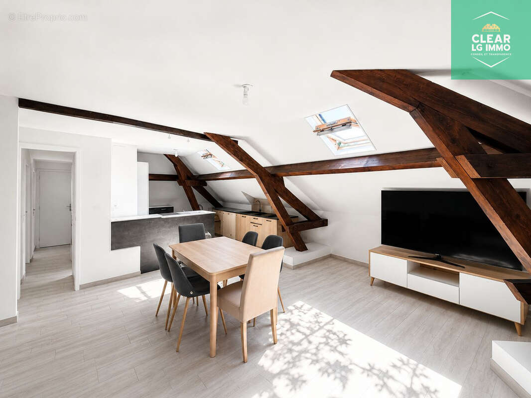 Appartement lumineux avec poutres apparentes - photo 3