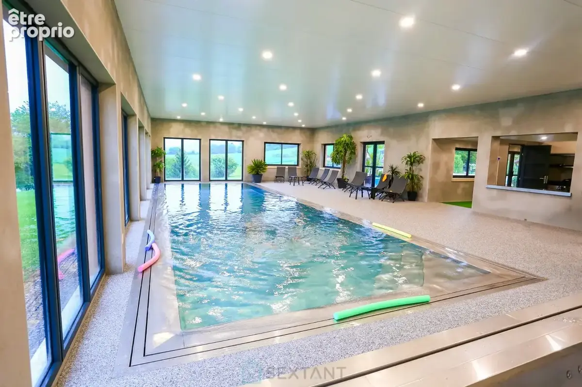 Somptueux domaine de 27 hectares dédié à l'événementiel, offrant un bâti immobilier d'environ 1800m² avec piscines et 5 étangs a - photo 12