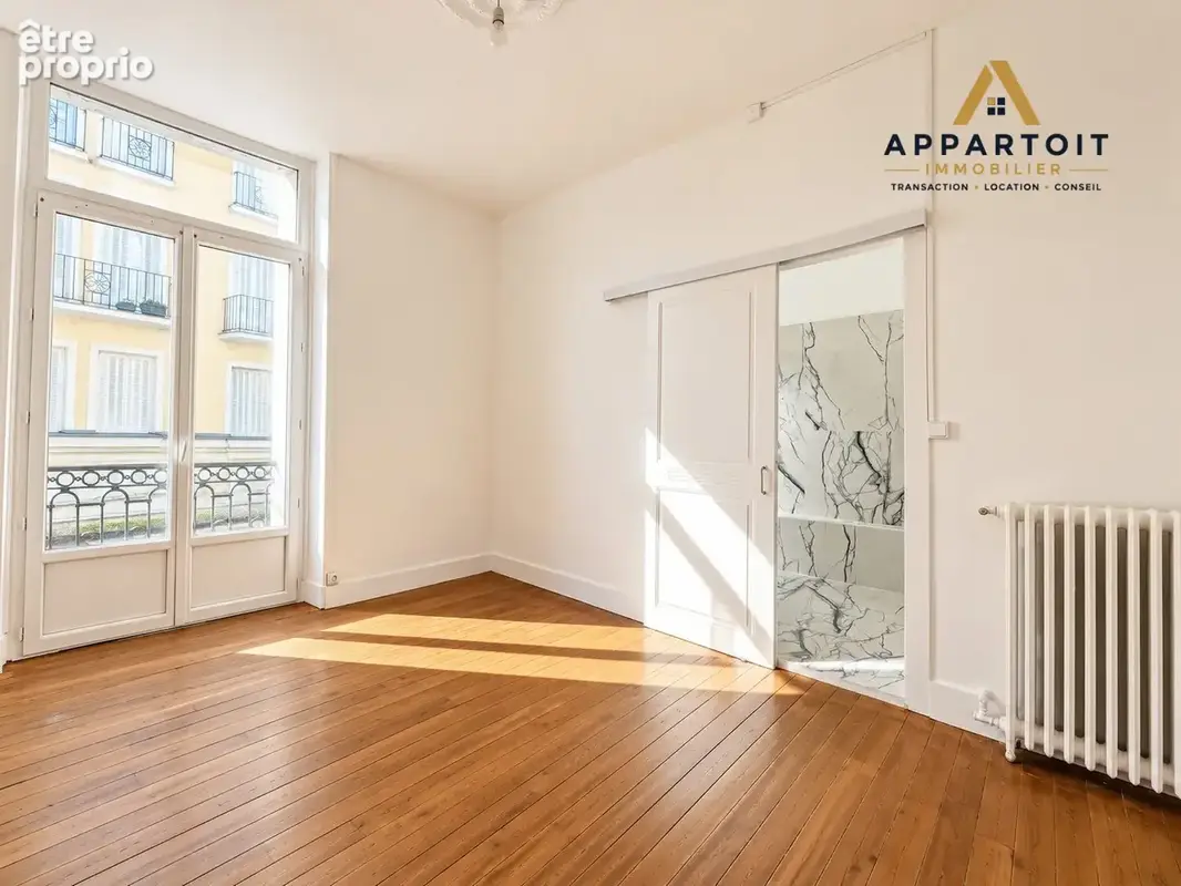 Appartement 3 pièces 55 m² à vendre à Vichy (03200) - photo 6