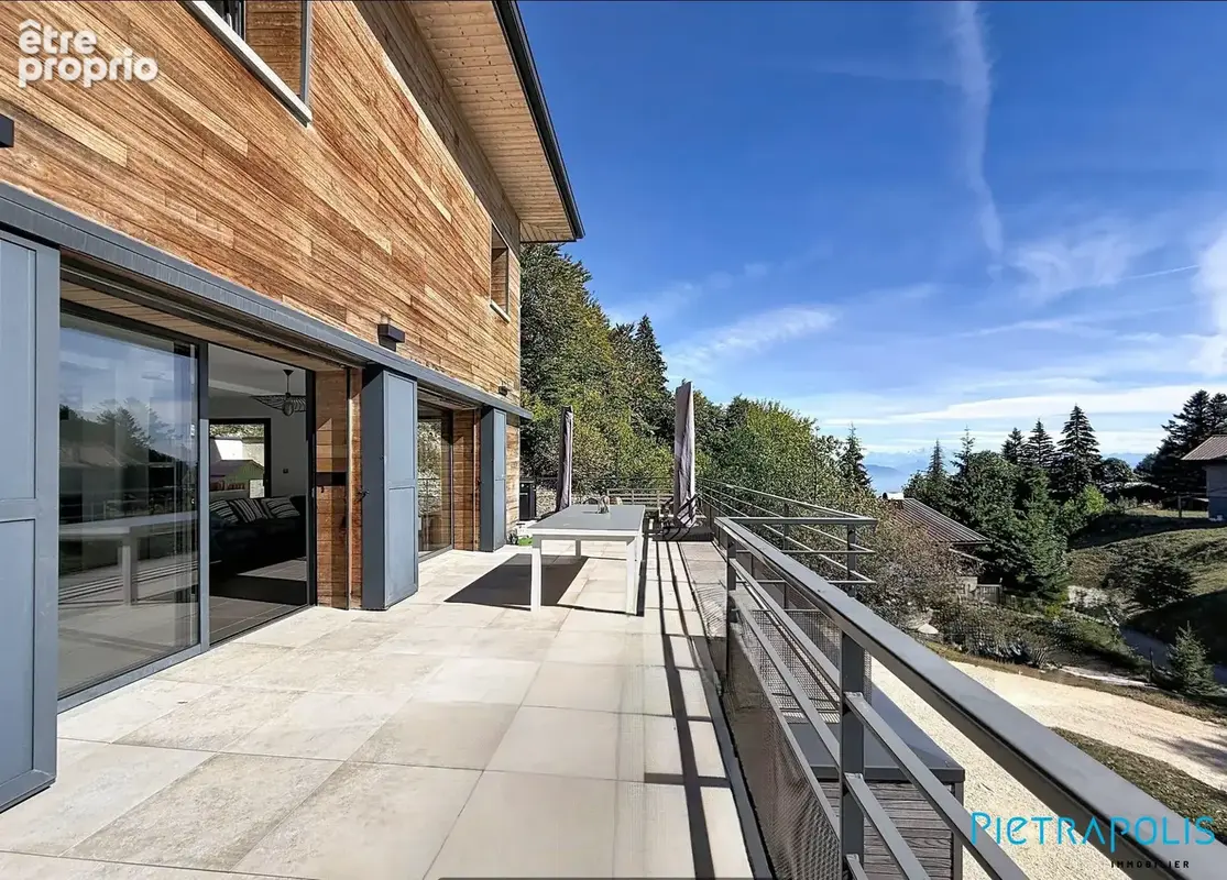 Maison 7 pièces 230 m² à vendre à Mijoux (01170) - photo 1