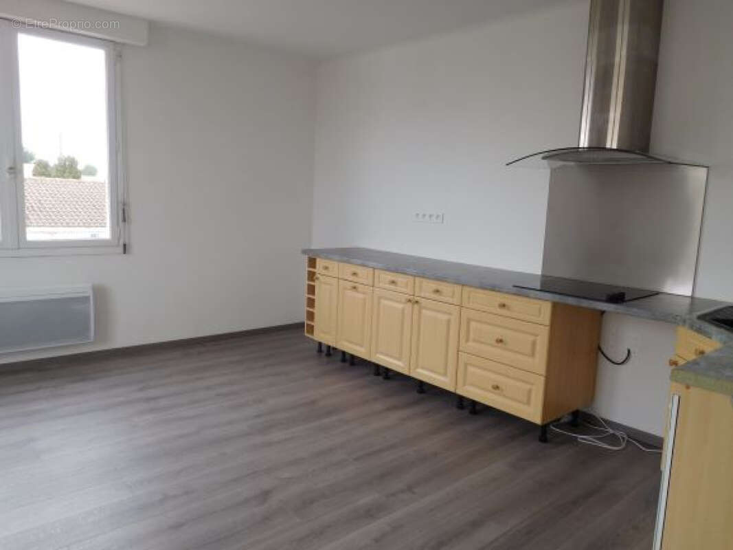 Ensemble immobilier d'habitations et de commerces - photo 11