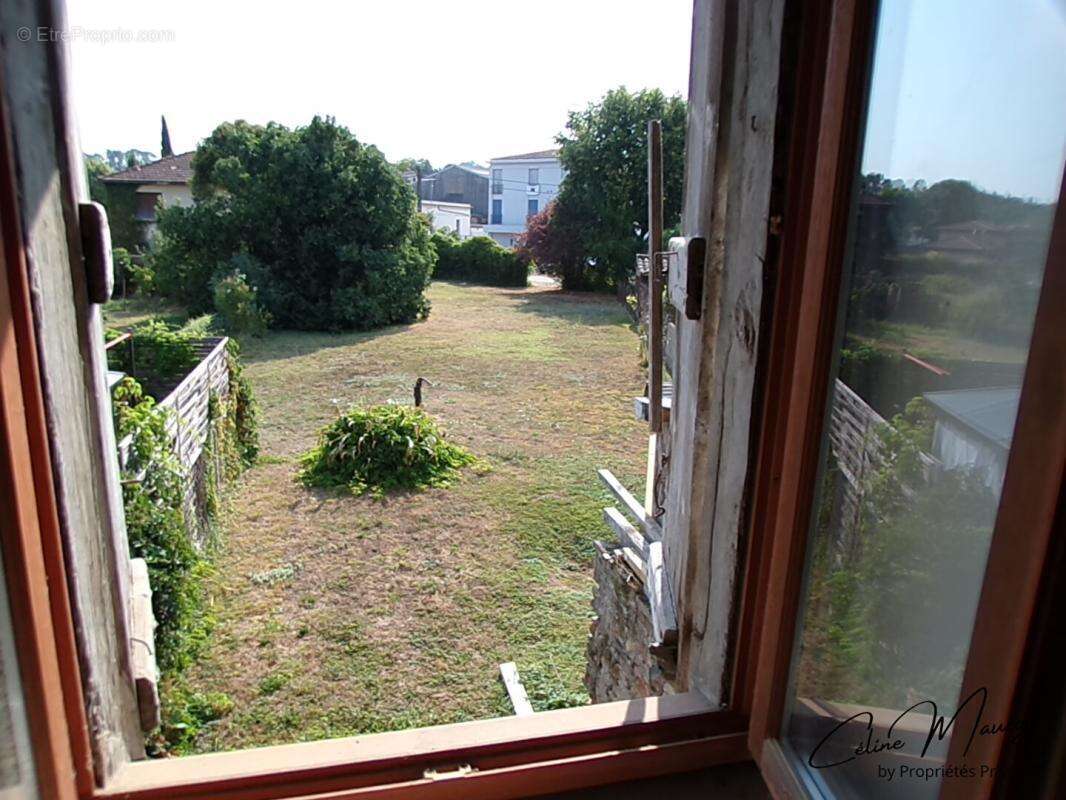 Maison mitoyenne à rénover - Fort potentiel - Terrain de 670 m2 - photo 3